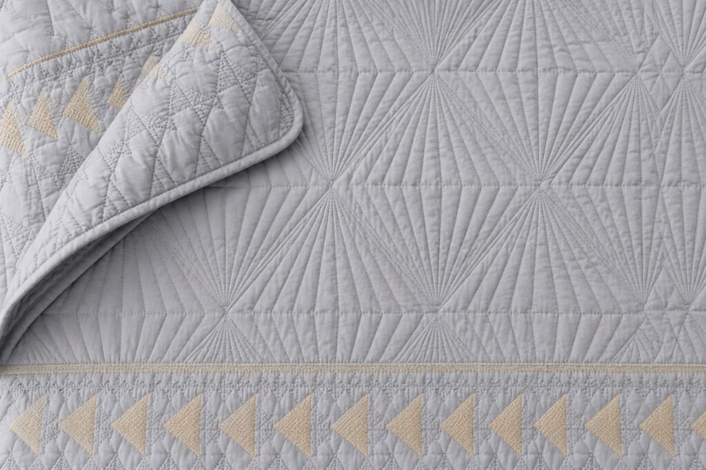 `Quilted cotton Couch Cover for Dogs fabric close-up`
